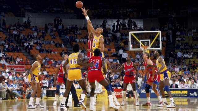 LOS ANGELES - 1987: Kareem Abdul-Jabbar #33 of the Los Angeles Lakers wins the tip off during an NBA game against the Los Angeles Clippers at the Great Western Forum in Los Angeles, California in 1987. (Photo by Stephen Dunn/Getty Images)