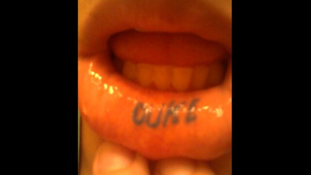 Duke lip tattoo