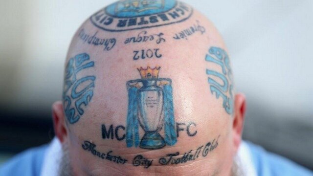Manchester City head tattoo