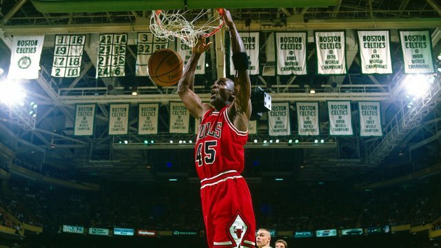 Michael Jordan dunks the ball