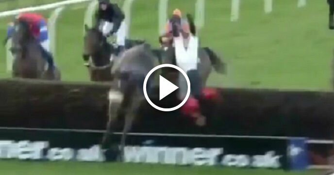 Jockey Falls Off Horse in Middle of Jump and Suffers Nasty Collision as a Result