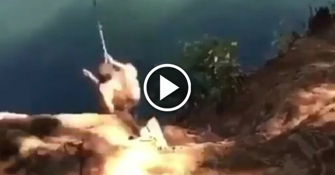 Bro Attempts to Rope Swing Into Water, Hits Butt on Massive Rock and Falls Into the Water