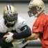 Mark Ingram takes a hand off from Drew Brees