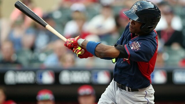 World infielder Rosell Herrera hits a single in the 7th inning during the All Star Futures Game at Target Field. 