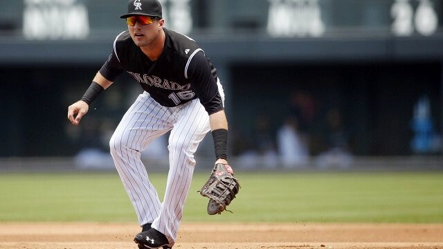 Colorado Rockies first baseman Kyle Parker (16) during the first inning against the San Diego Padres at Coors Field. 