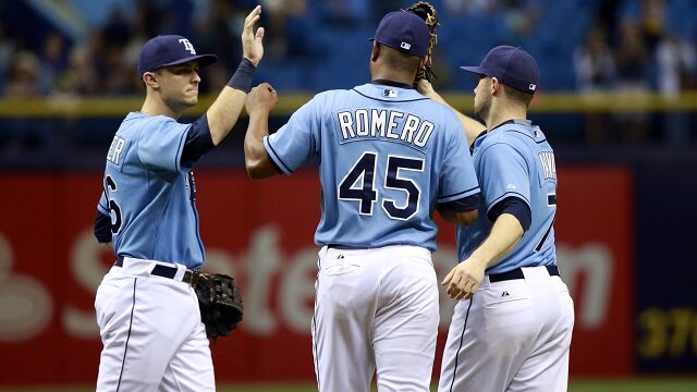 Richie Shaffer and two other Tampa Bay Rays high five