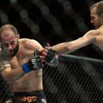 Cole Miller lands punch on Sam Sicilia at UFC Fight Night 35