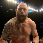 Travis Browne reacts after defeating Josh Barnett at UFC 168