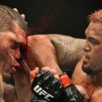 Mark Hunt lands elbow on Antonio Silva during epic war at UFC Fight Night 33