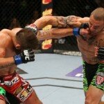 Cub Swanson and Jeremy Stephens exchange punches during UFC Fight Night 44 main event
