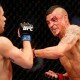 Diego Sanchez lands punch on Myles Jury during UFC lightweight battle