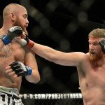 Josh Barnett lands punch on Travis Browne during UFC 168 heavyweight contest