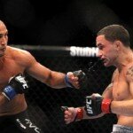 B.J. Penn lands punch on Frankie Edgar during UFC 118 lightweight title rematch