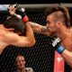 Brandon Thatch punches Paulo Thiago during welterweight clash at UFC Fight Night 32