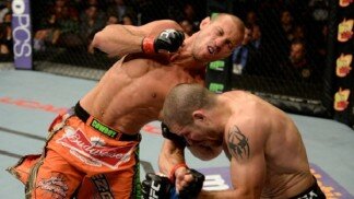 Donald Cerrone punches Jim Miller during UFC lightweight battle