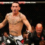 Max Holloway reacts after finishing Clay Collard at UFC Fight Night 49