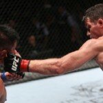 Michael Bisping punches Cung Le during UFC Fight Night 48 main event in Macau