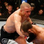 Georges St.Pierre battles Johny Hendricks during welterweight title bout at UFC 167