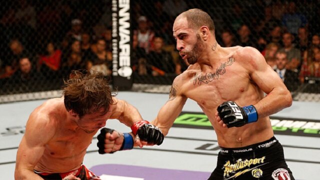 Chico Camus punches Brad Pickett during UFC Fight Night 57 flyweight clash