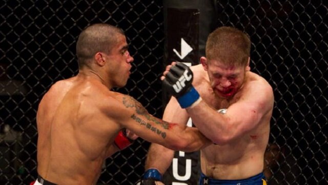 Thiago Tavares punches Nik Lentz during lightweight battle at UFC Fight Night 20
