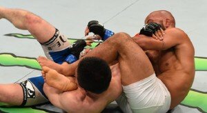 Demetrious Johnson finishes Kyoji Horiguchi via armbar during UFC 186 flyweight title clash