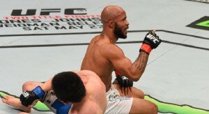 Demetrious Johnson reacts after successful flyweight title defense at UFC 186 against Kyoji Horiguchi