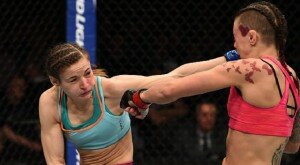 Maryna Moroz punches Joanne Calderwood at UFC Fight Night 64 in Krakow, Poland