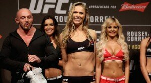 Ronda Rousey poses after making weight for UFC 190 title defense in Brazil against Bethe Correia
