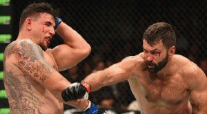 Andrei Arlovski punches Frank Mir during UFC 191 co-main event