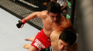 Dominick Cruz batters Takeya Mizugaki during UFC 178 bantamweight action