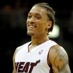 Oct 11, 2013; Kansas City, MO, USA; Miami Heat small forward Michael Beasley (8) smiles during a break against the Charlotte Bobcats in the second half at Sprint Center. Miami won 86-75. Mandatory Credit: John Rieger-USA TODAY Sports