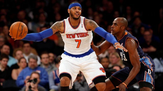 Jan 24, 2014; New York, NY, USA; Charlotte Bobcats power forward Anthony Tolliver (43) defends against New York Knicks small forward Carmelo Anthony (7) who scored 37 points in the first half at Madison Square Garden. Mandatory Credit: Noah K. Murray-USA TODAY Sports