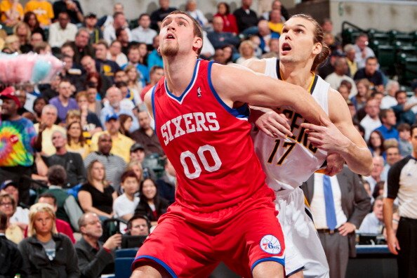 INDIANAPOLIS, IN - APRIL 21: Spencer Hawes #00 of the Philadelphia 76ers fights for position against Louis Amundson #17 of the Indiana Pacers on April 21, 2012 at Bankers Life Fieldhouse in Indianapolis, Indiana. NOTE TO USER: User expressly acknowledges and agrees that, by downloading and or using this Photograph, user is consenting to the terms and condition of the Getty Images License Agreement. Mandatory Copyright Notice: 2012 NBAE (Photo by Ron Hoskins/NBAE via Getty Images)