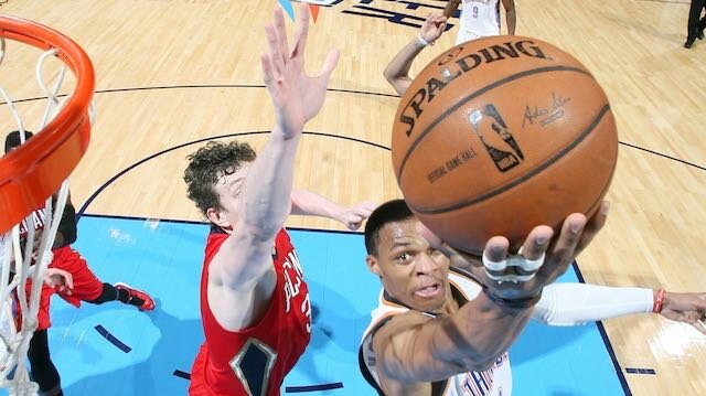 Russell Westbrook of the Oklahoma City Thunder goes up for a shot against the New Orleans Pelicans on December 21, 2014 at Chesapeake Energy Arena in Oklahoma City, OK. (Photo by Layne Murdoch Jr./NBAE via Getty Images)