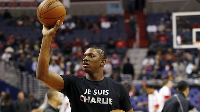 Washington Wizards center Kevin Seraphin wears a t-shirt honoring victims of the Charlie Hobdo terrorist attack in Paris during warm ups prior to the Wizards game against the Chicago Bulls at Verizon Center. The Wizards won 102-86. Geoff Burke-USA TODAY Sports