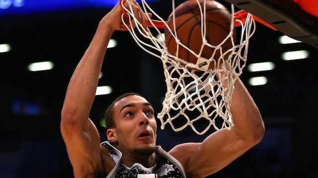 NBA World Team's Rudy Gobert of the Utah Jazz dunks the ball during the BBVA Compass Rising Stars Challenge as part of the 2015 NBA Allstar Weekend at the Barclays Center on February 13, 2015 in the Brooklyn borough of New York City.(Photo by Elsa/Getty Images)
