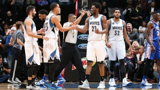 Timberwolves team talking after a foul is committed
