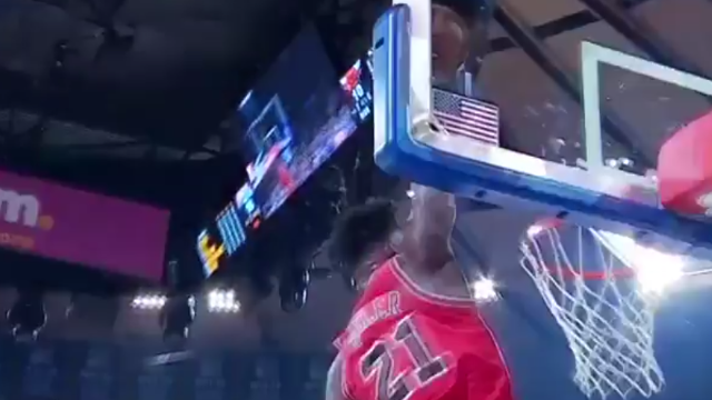 Chicago Bulls\' Jimmy Butler Rises Way Above the Rim for Alley-Oop from Rajon Rondo