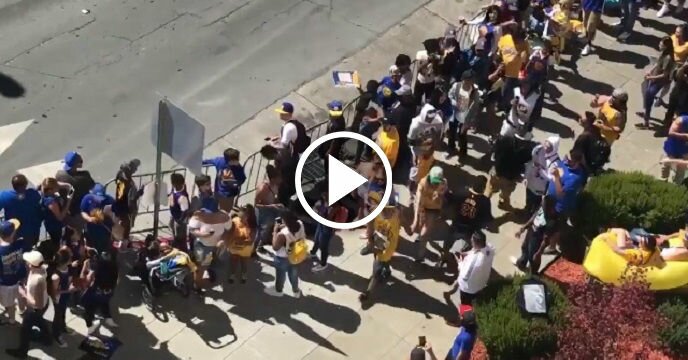Dude With a Set of Stones Crashes Warriors' Victory Parade in LeBron James Jersey