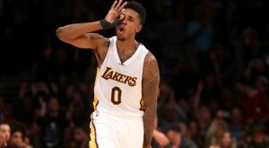Nick Young celebrates after a made shot