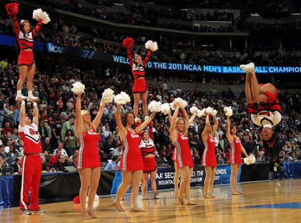 DENVER, CO - MARCH 17: The St. John's Red Storm cheerleaders peform during the second round of the 2011 NCAA men's basketball tournament at Pepsi Center on March 17, 2011 in Denver, Colorado. (Photo by Doug Pensinger/Getty Images)