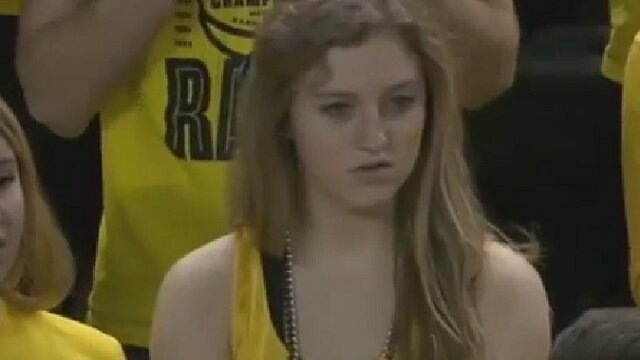 Michigan Fan Stares in Disbelief During Loss to EMU
