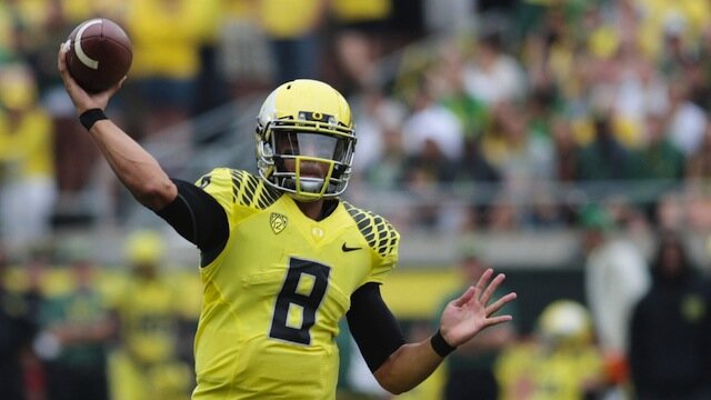 Oregon QB Marcus Mariota and the Ducks torched Tennessee's defense for over 667 yards.