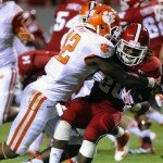 Clemson safety Korrin Wiggins takes down NC State running back Tony Creecy