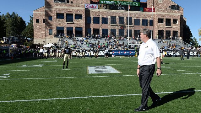  Oct 5, 2013; Boulder, CO, USA; Colorado Buffaloes head coach Mike Macintyre walks the field before the start of the game against the Oregon Ducks at Folsom Field. Mandatory Credit: Ron Chenoy-USA TODAY Sports
