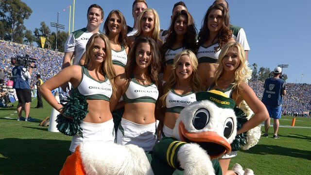 Oregon Ducks cheerleaders and mascot Puddles pose during the game against the UCLA Bruins at Rose Bowl. Oregon defeated UCLA 42-30. 