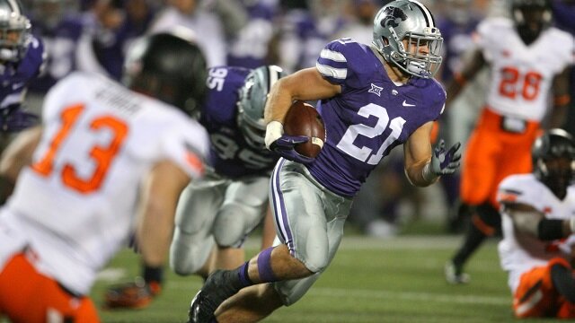 Kansas State Wildcats linebacker Jonathan Truman (21) looks for room to run following an interception during a 48-14 win against the Oklahoma State Cowboys at Bill Snyder Family Stadium
