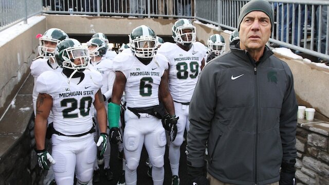 Michigan State Head Coach Mark Dantonio leads the Spartans against the Baylor Bears in the Cotton Bowl