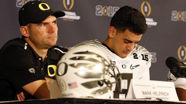 Oregon Ducks quarterback Marcus Mariota (8) reacts during a press conference after losing to the Ohio State Buckeyes in the 2015 CFP National Championship Game at AT&T Stadium. 