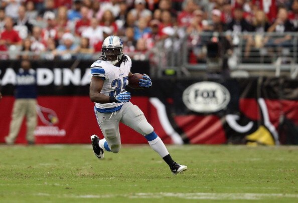 GLENDALE, AZ - SEPTEMBER 15: Running back Joique Bell #35 of the Detroit Lions carries the ball against the Arizona Cardinals at University of Phoenix Stadium on September 15, 2013 in Glendale, Arizona. (Photo by Jeff Gross/Getty Images)